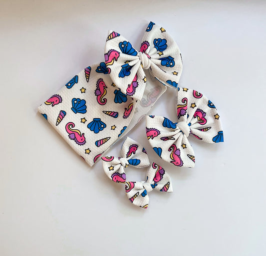 Traditional Bows - Under the Sea - Ev's Bowtique Shop, The most comfortable trendy bows for all of your babes. Traditional bows come styled as headwraps, Nylons, clips or pigtail sets! The choice is always yours!