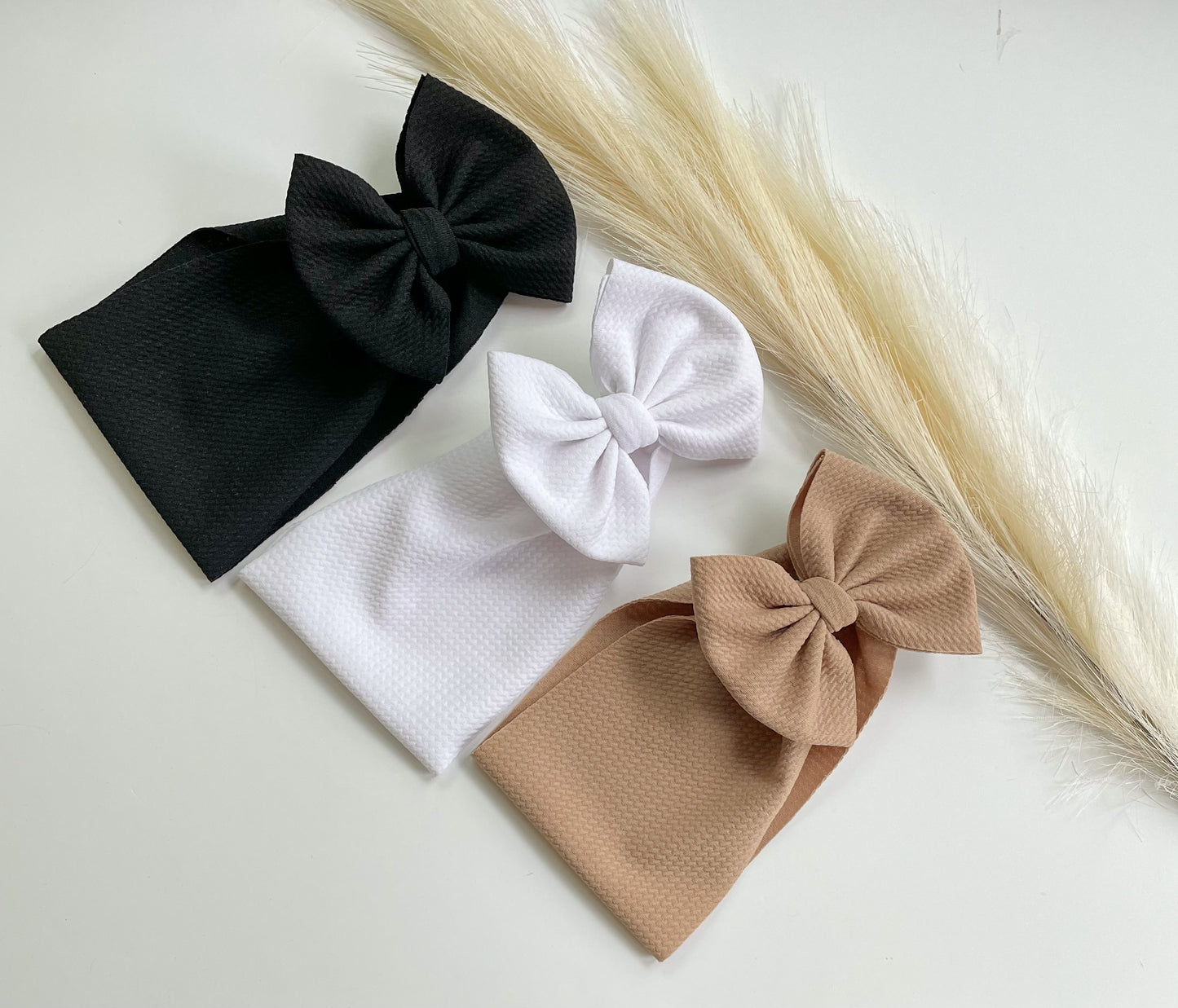 Neutral Originals - Ev's Bowtique Shop, The most comfortable trendy bows for all of your babes. Traditional bows come styled as headwraps, Nylons, clips or pigtail sets! The choice is always yours!