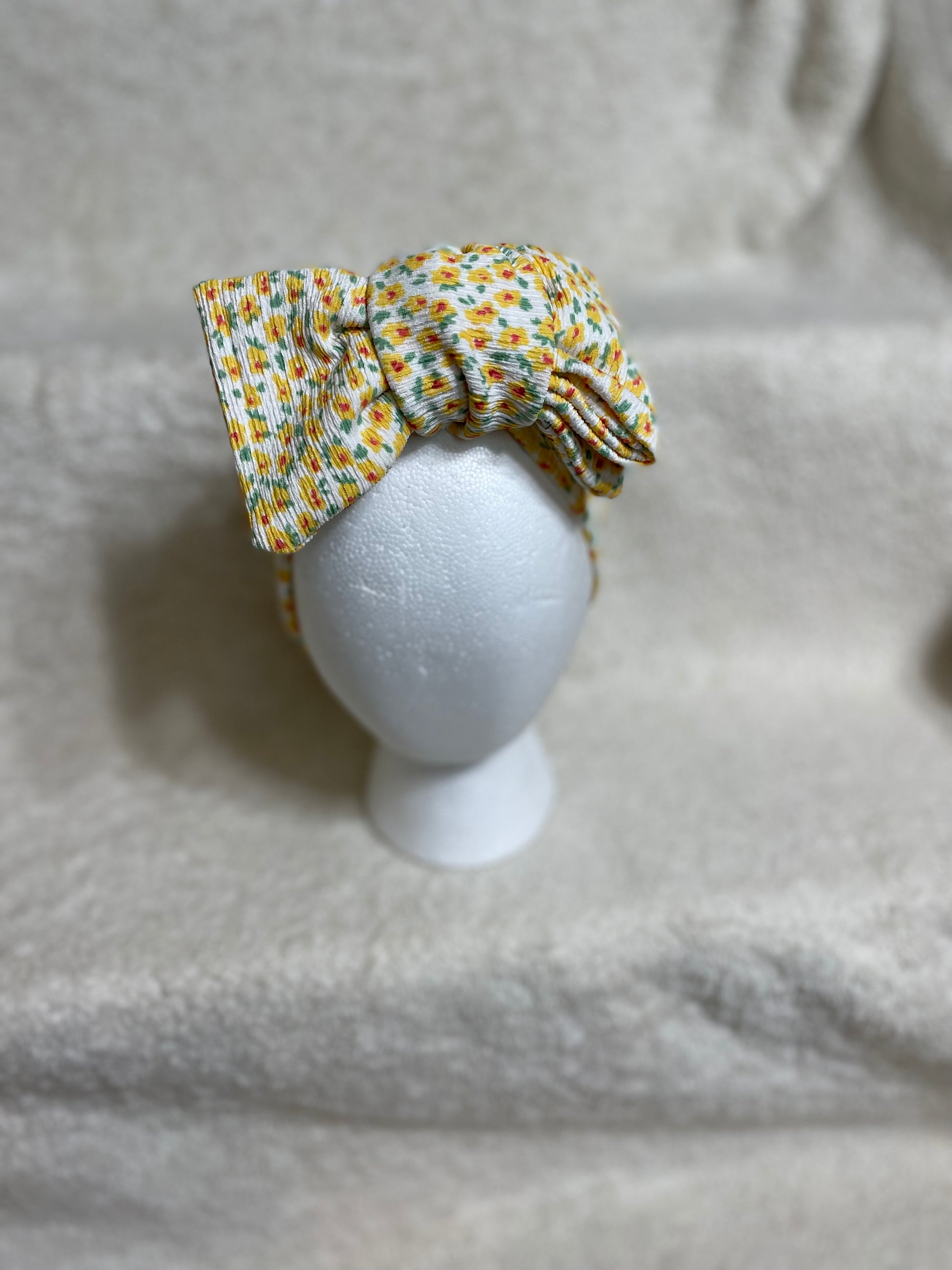 Oversized headwrap - Yellow Daisy’s - Ev's Bowtique Shop Oversized headwraps are made to grow with your babies from newborn, infant to toddler as they are re-tieable/adjustable! Being made from soft stretchy fabric makes them the perfect essential for everyday wear or to make a statement✨ As always handle with care, your bows are delicate items!